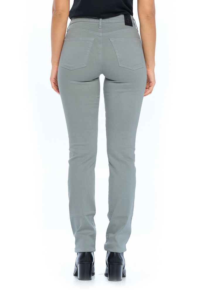 Back view of a model wearing Aviator's fly straight steel grey travel jeans.