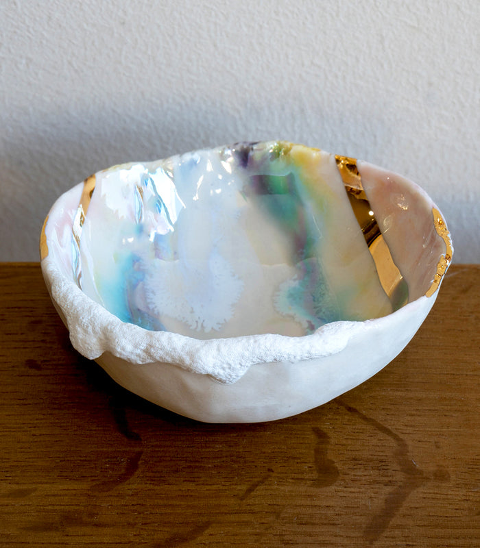 Mini Prism Ring Dish G-004 in white with iridescent prism interior and gold accents on wood table