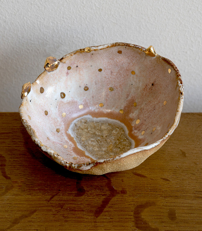Northern Lights Ring Dish G-005 gold-speckled ceramic ring dish with small prong accents on wood